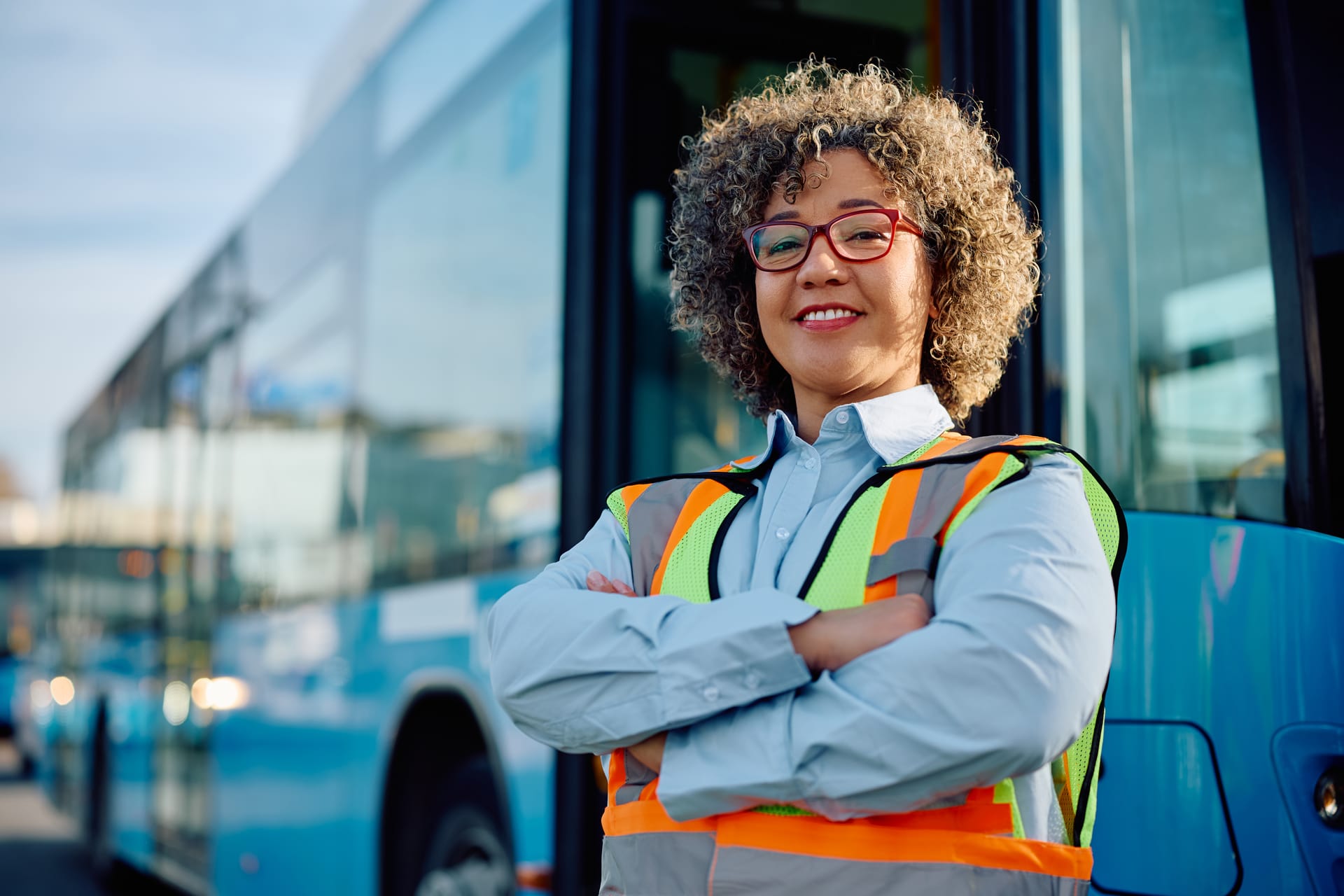 Professional bus driver with fleet vehicles