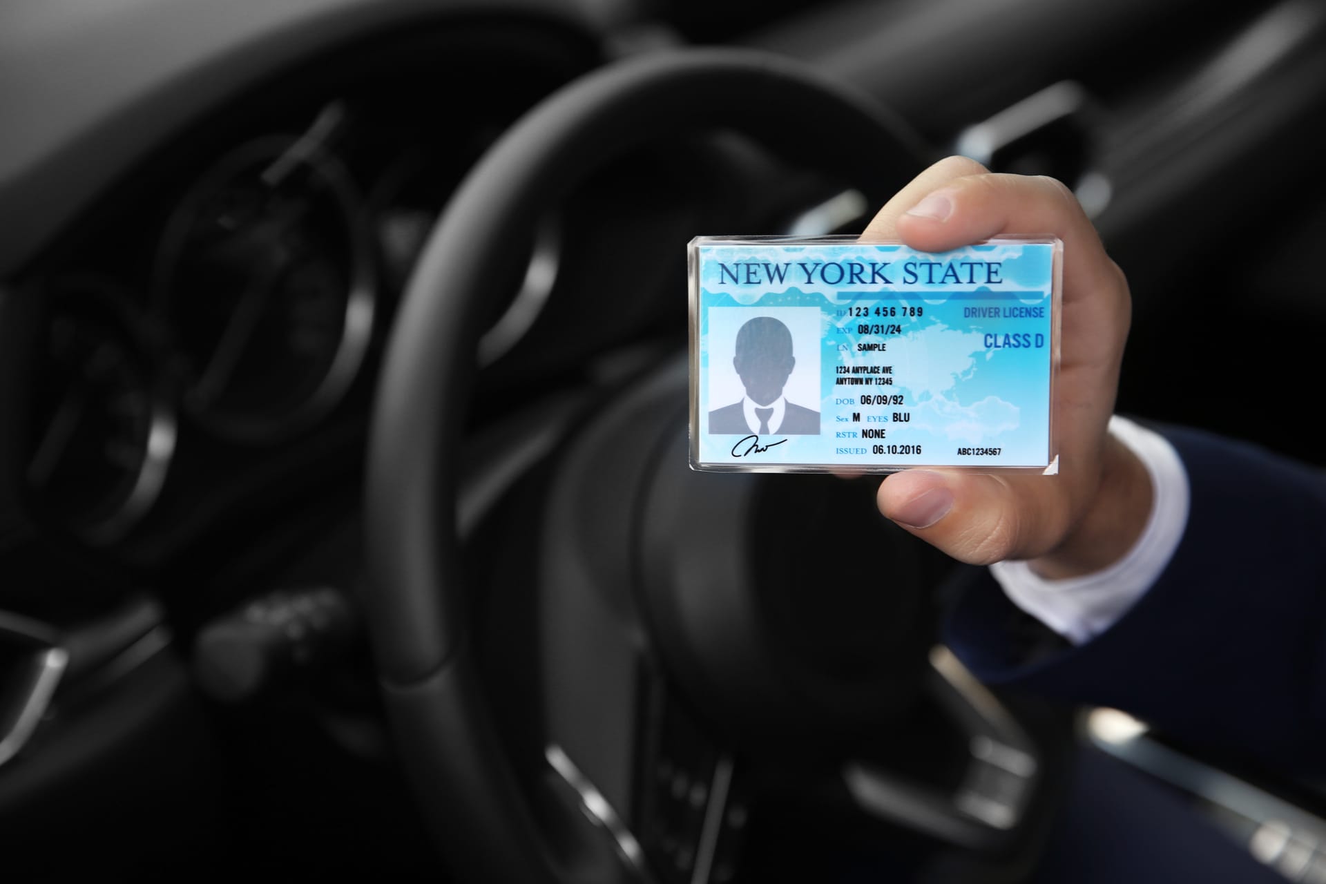 Driver holding license for fleet credential management